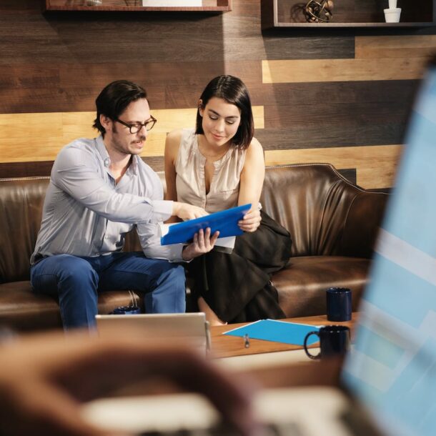 business man and woman meeting at work in office QX9VMGL