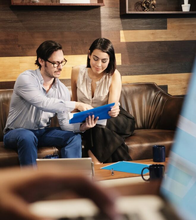 business man and woman meeting at work in office QX9VMGL