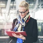 businesswoman writing waiting flight concept PA72YZ6