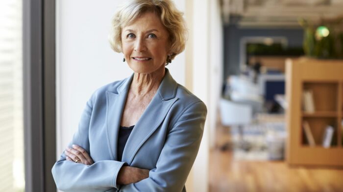 portrait of smiling senior businesswoman in KEHVBZY