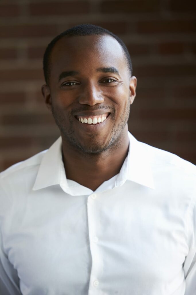 head and shoulders portrait of businessman in PWN5RXU